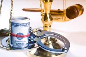 Wooden justice gavel and block with brass